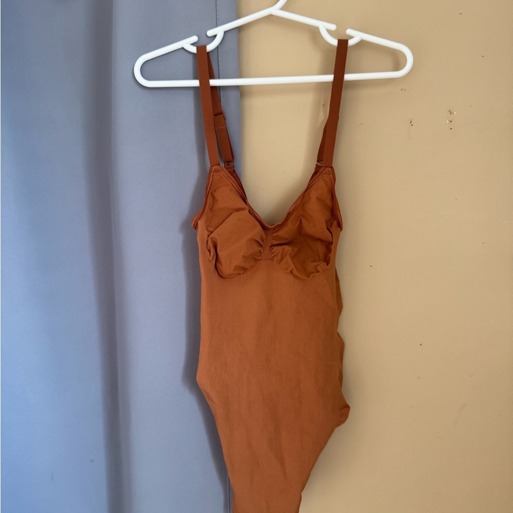 SKIMS Kids Bodysuit in Warm Brown